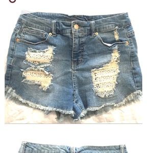 High waisted distressed denim shorts